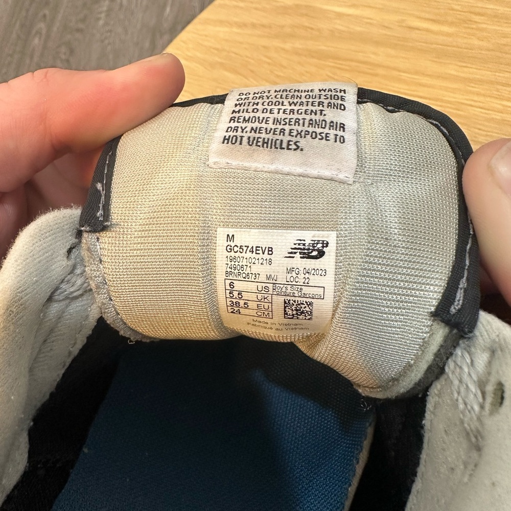 New Balance Black and White Athletic Shoes